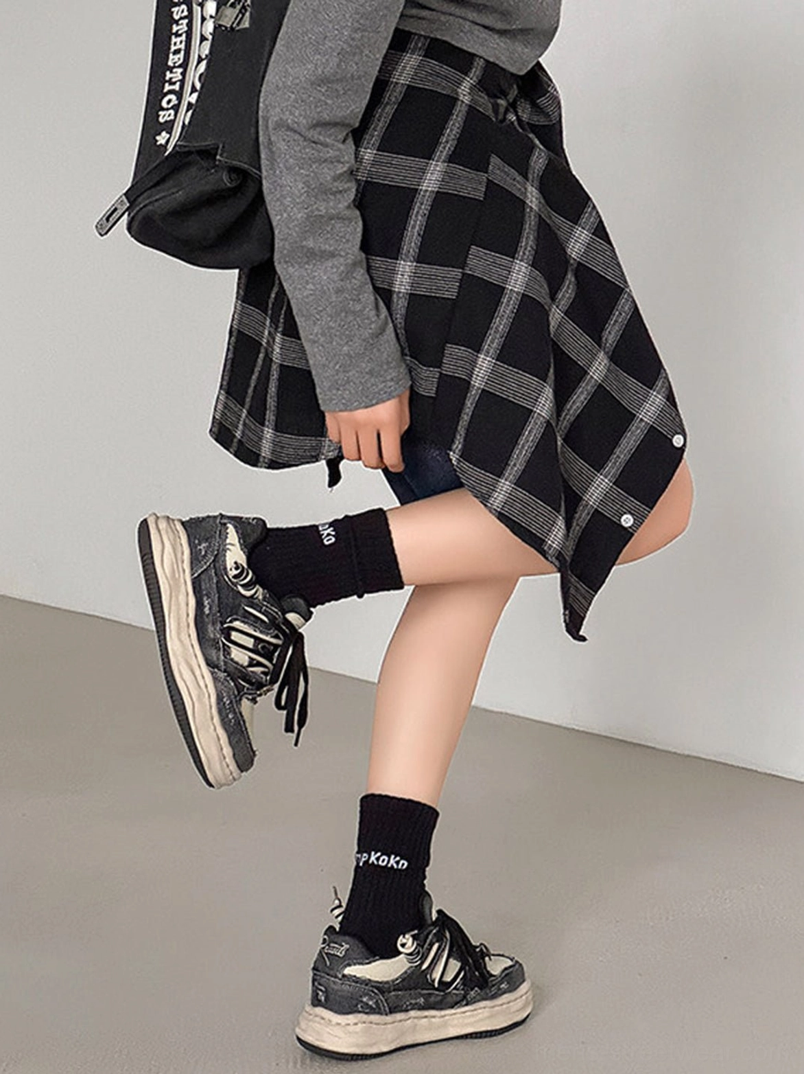 Retro platform denim sneakers with color-blocked panels and worn-in texture for contemporary East Asian streetwear