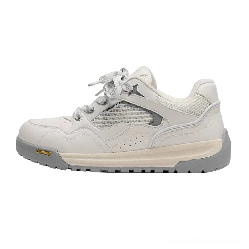Off-white and light gray retro runner sneakers with breathable mesh upper layered panels and thick rubber streetwear sole