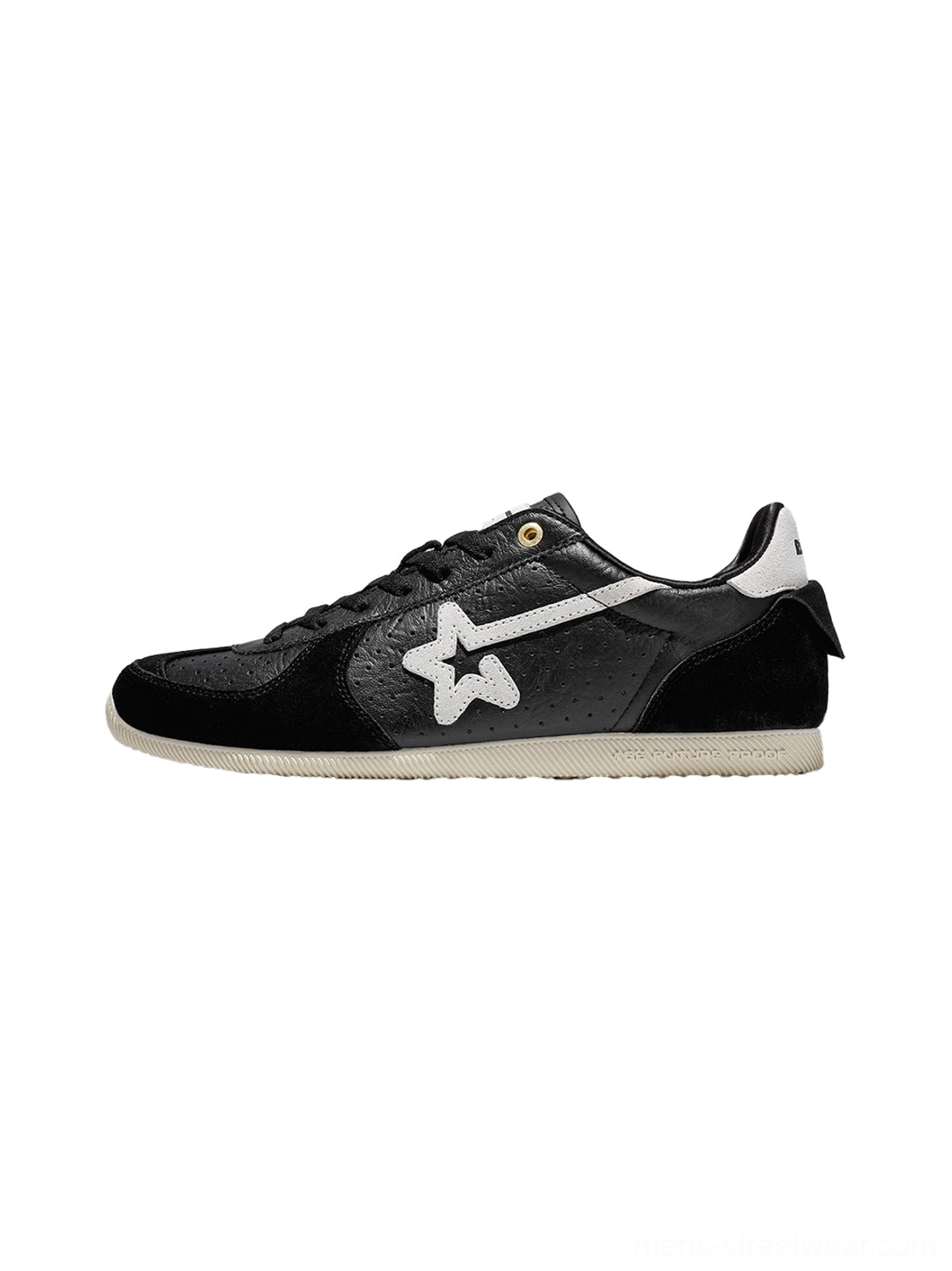Black and white low-profile suede streetwear trainer with white star side logo and light beige rubber outsole