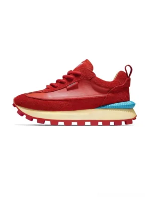 Red retro trail fusion leather sneaker side profile with blue heel accent and chunky rubber grip sole