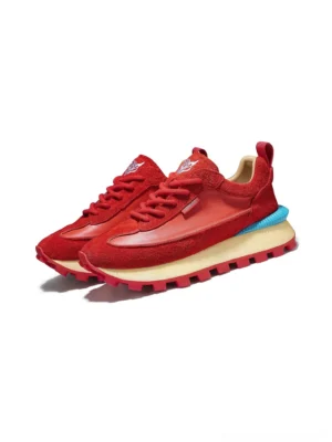 Pair of red retro trail fusion leather sneakers with contrasting blue heel details and cream red chunky soles