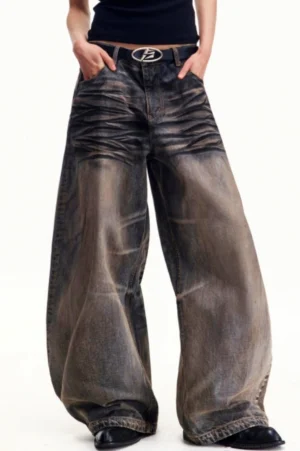 Front view of retro washed charcoal wide-leg streetwear jeans with faded distressed texture and loose draping legs