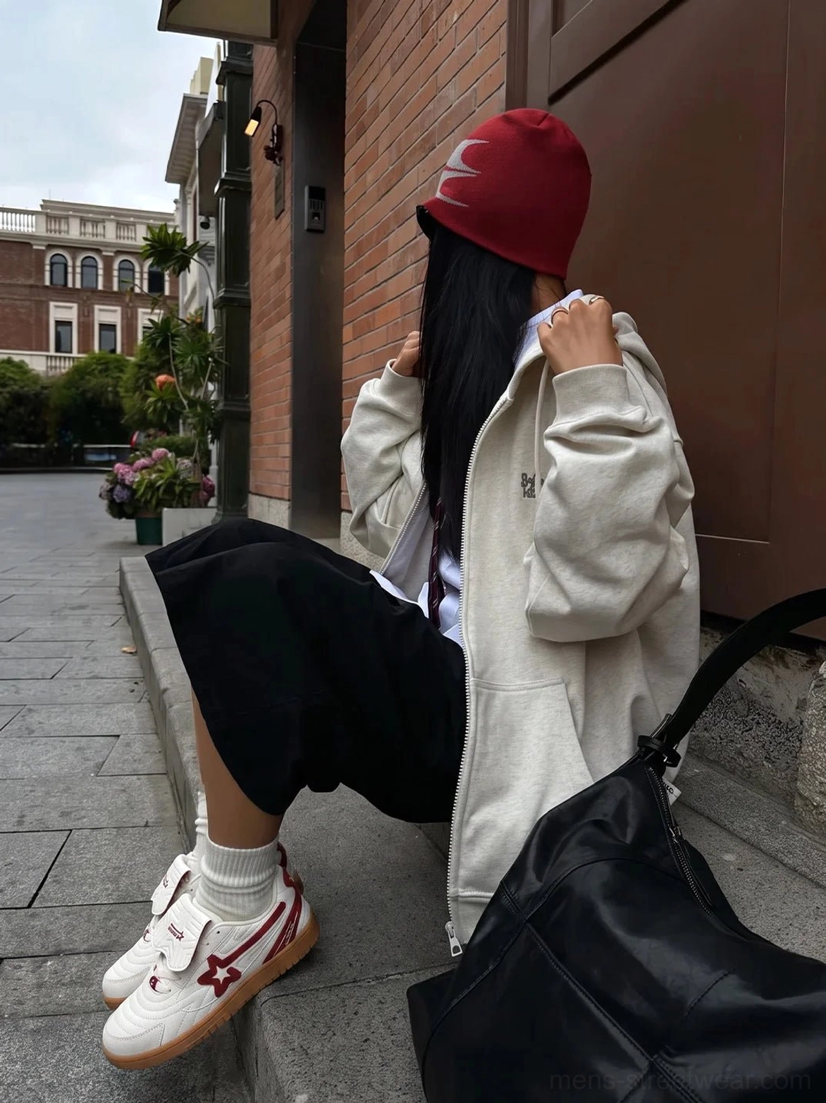 Rice-white and wine-red retro star panel sneakers styled on outdoor brick steps with relaxed Korean streetwear layers