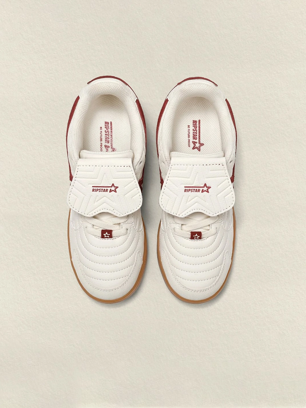 Rice red star panel retro court sneakers detailed product view with suede star panel, contrast stitching and classic gum outsole