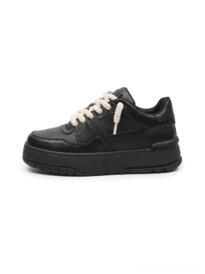 Chunky platform streetwear sneakers with thick rope laces shown in a clean side profile on a white studio background