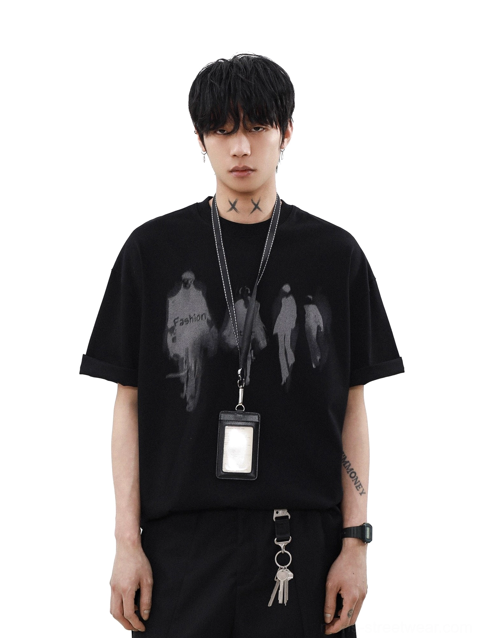 Black oversized graphic crewneck tee with faded figure artwork, rolled sleeves, and streetwear keychain styling