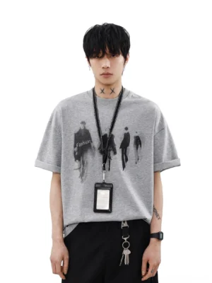 Heather gray Runway Shadows oversized graphic tee with blurred runway figure print, rolled cuffs, and Seoul streetwear styling