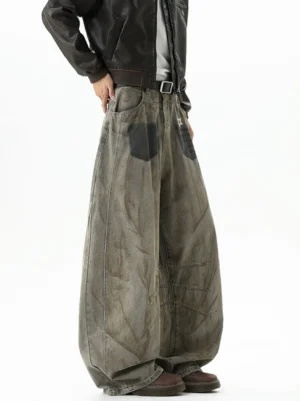 Left rear three-quarter view of vintage washed brown balloon jeans showing relaxed wide-leg drape, natural denim creases, and distressed workwear texture