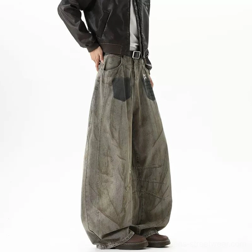 Right rear full view of oversized vintage washed denim jeans with clear back pocket construction, natural creasing, and relaxed balloon silhouette