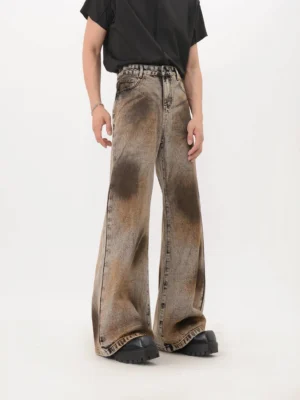 Front full body view of black rust eclipse vintage wash wide leg flare denim jeans styled with a black short sleeve streetwear t shirt