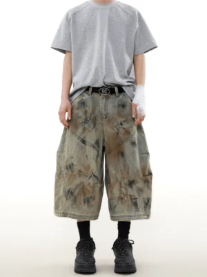 Oversized rust storm dyed cargo denim shorts with muted earthy tones classic waistband and relaxed streetwear fit