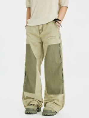 Green sage panel wide-leg utility jeans with olive reinforced front patches styled with knit top and chunky sneakers