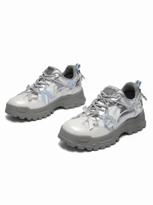 Pair of silver Sakura plush chunky trail sneakers showing furry inner lining, blue floral ribbon accents, and thick gray trail-inspired rubber soles
