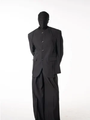 Full body front view of a sculpted black stand collar blazer and wide-leg tailored suit set in minimalist Korean streetwear style