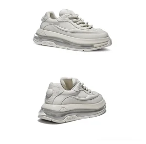 All off-white low-top leather air cushion sneaker with sculpted sole shown in right lateral profile on white background