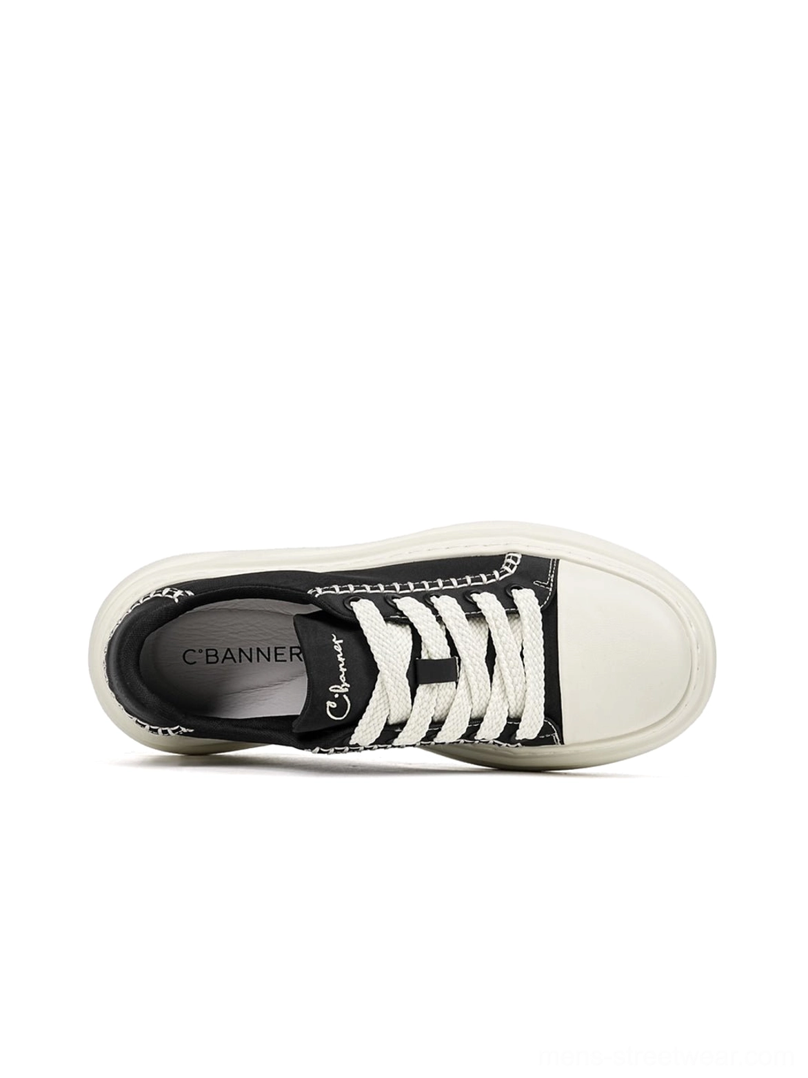 Seoul-inspired black chain-trim canvas platform sneakers with bold white stitching and chunky sole for alternative casual fashion