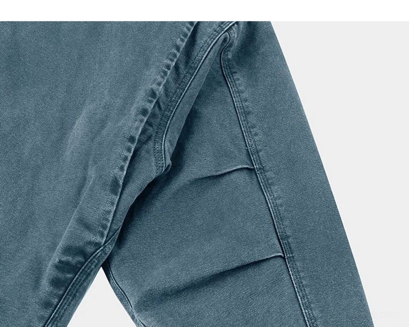 Seoul-inspired two-tone work jacket with cotton canvas shell, black corduroy collar, and practical layered streetwear styling