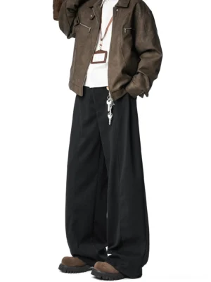 Black Seoul scholar wide-leg trousers for men styled with a leather jacket and vintage streetwear layers