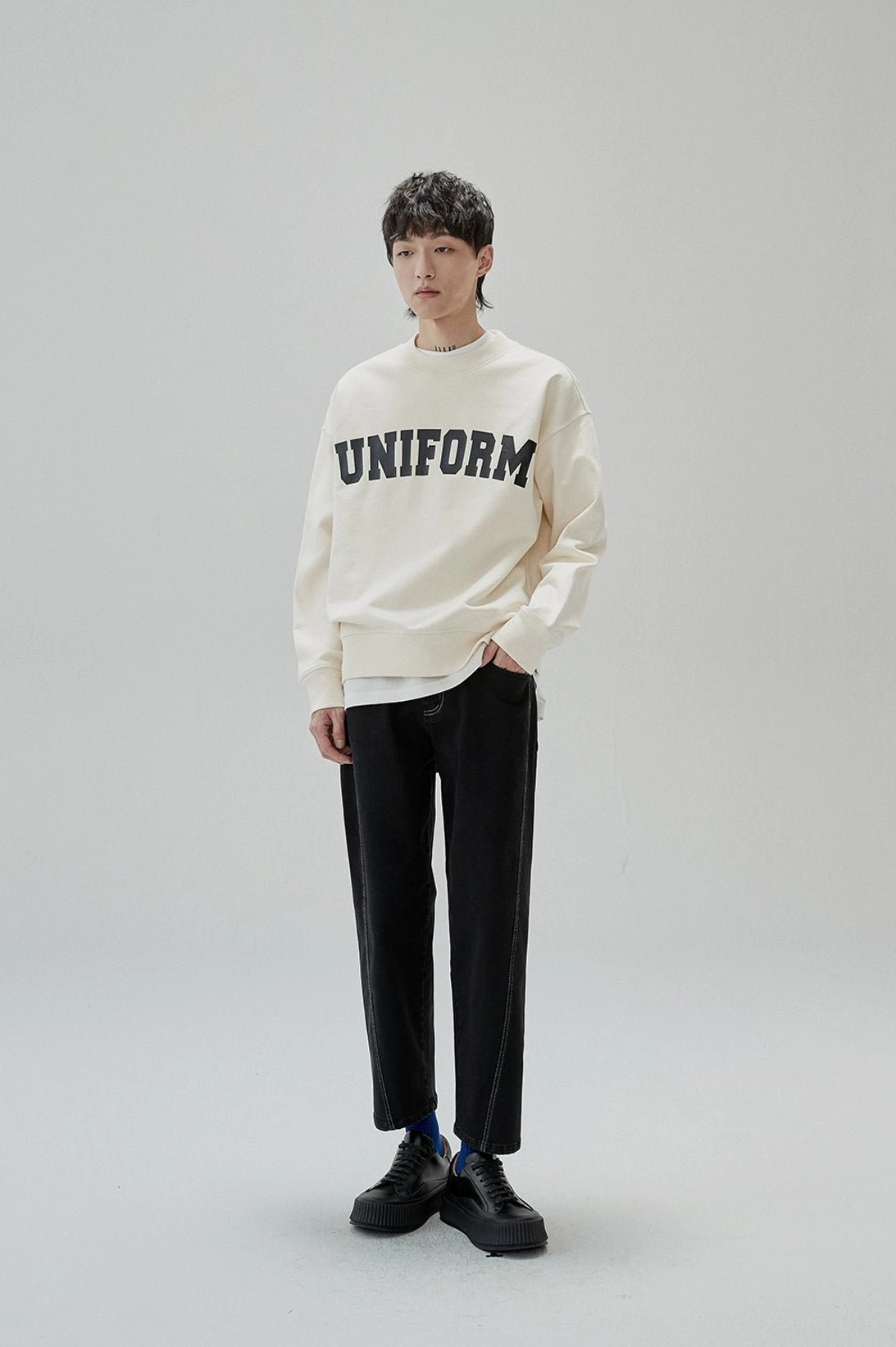 Seoul streetwear inspired UNIFORM sweatshirt with roomy body and vintage graphic character