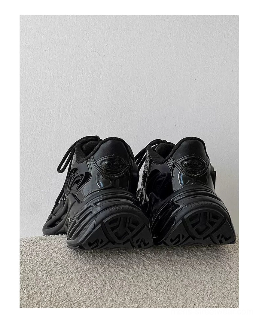 Modern silver and black technical runner sneakers with sculpted sole for Korean streetwear outfits