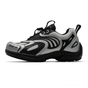Silver black techwear mesh runner sneakers shown in a left side profile on a white studio background with breathable mesh panels, futuristic layered overlays, and a chunky rubber sole