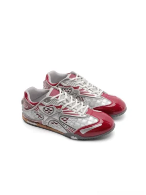 Front view of silver and burgundy Y2K heart mesh retro sneakers with glossy patent toe panels, breathable hollow mesh upper, lace-up fastening, metallic overlays, and flat EVA outsole on a white studio background