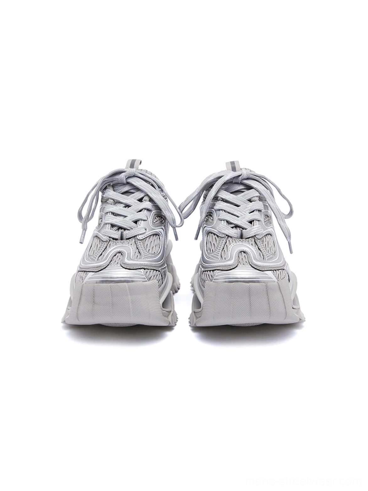 Matching pair of silver chunky runner sneakers with streamlined upper lines and split-platform sculpted soles in a streetwear product display