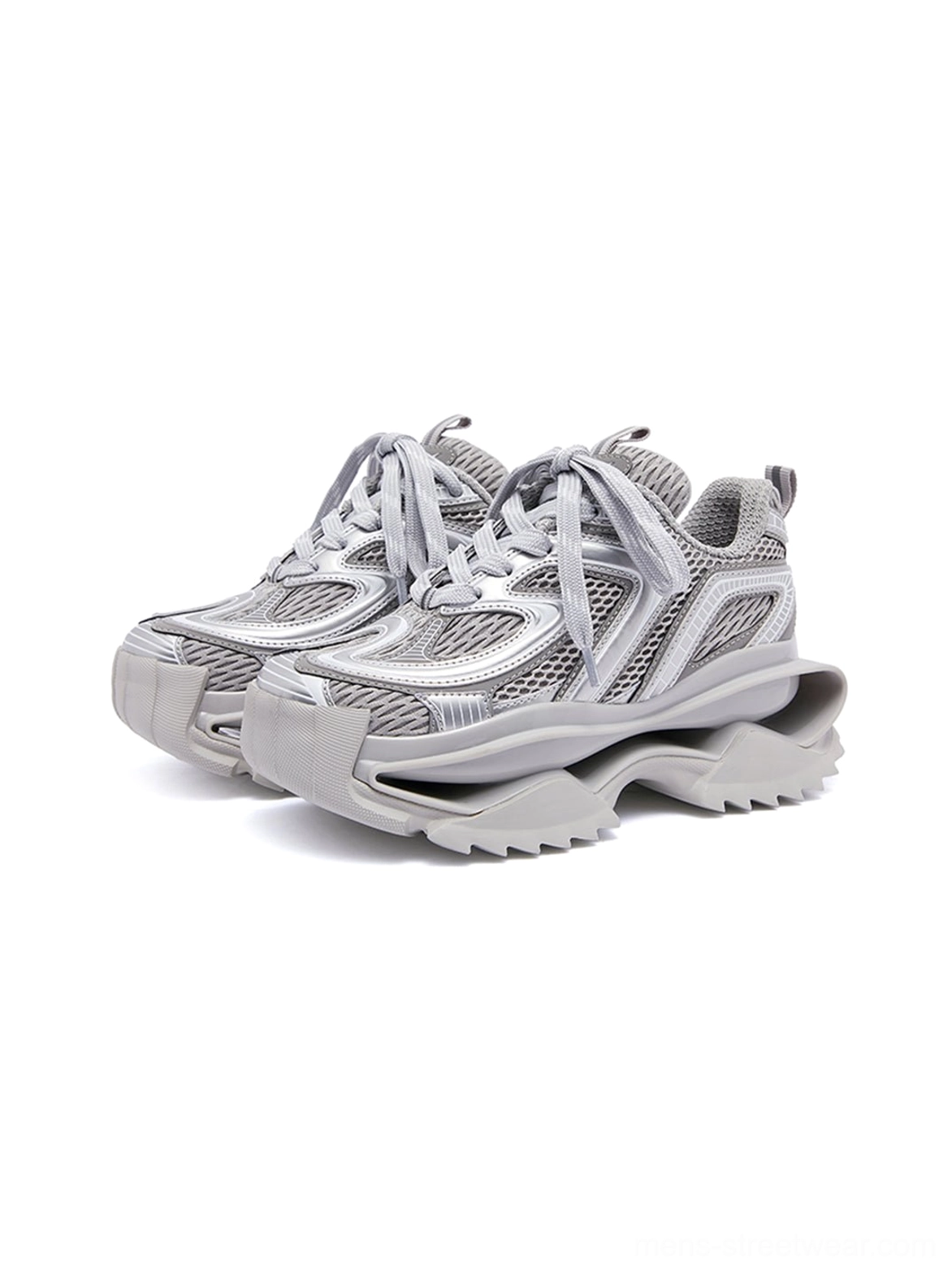 Front view of a pair of silver gray running sneakers with symmetrical laces, breathable mesh panels, and a monochrome chunky streetwear finish