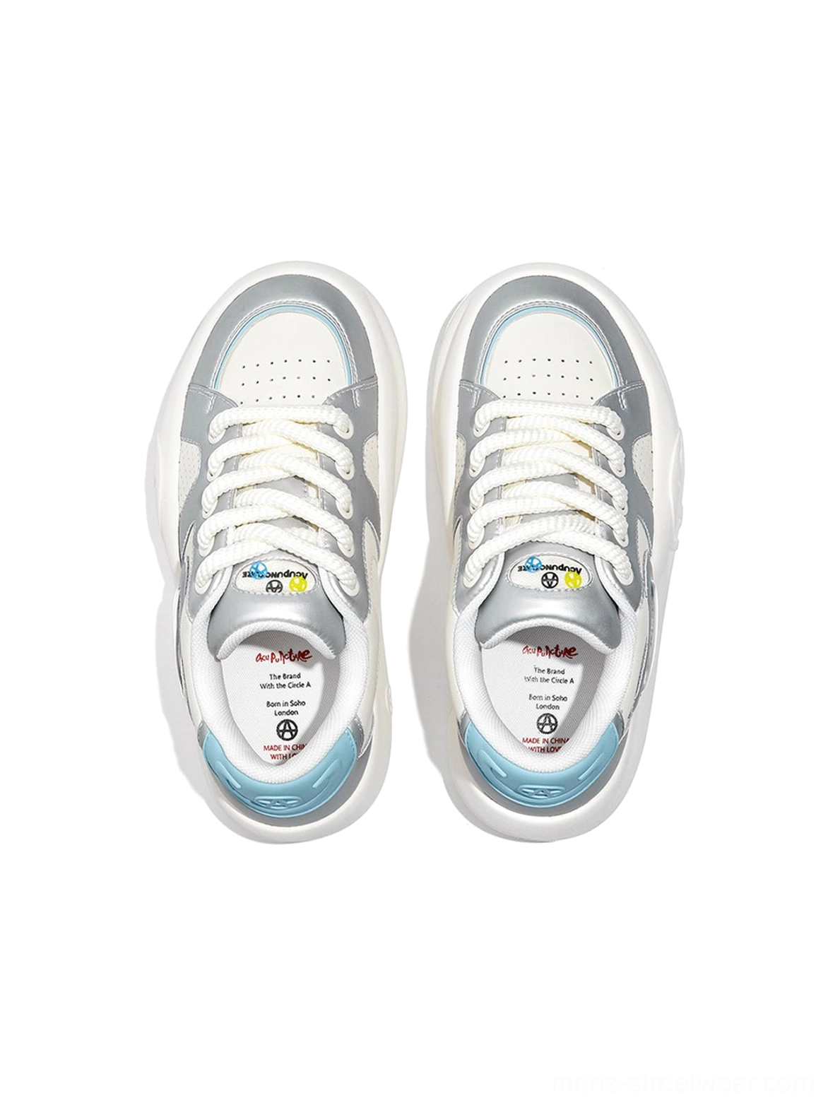 Silver metallic platform sneakers with chunky white sole and futuristic Korean streetwear styling