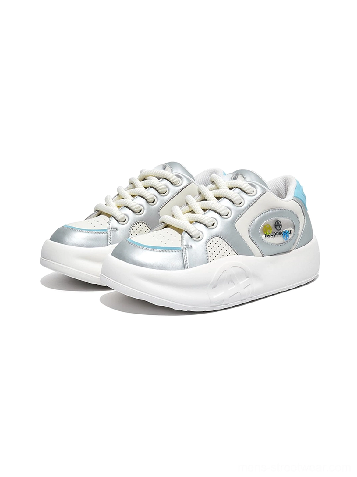 Neatly aligned pair of silver metallic platform sneakers with silver toe panels, matching color accents, and decorative side patches