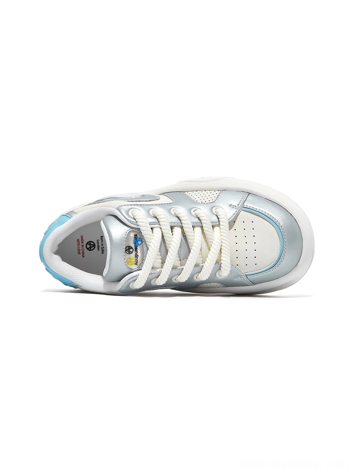 Silver metallic streetwear platform sneakers with bold chunky proportions, breathable upper sections, and clean white outsole