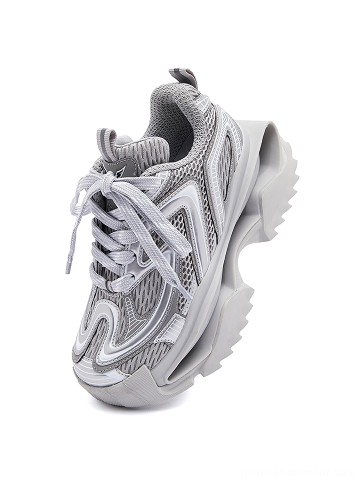 Top-down view of silver runner sneakers featuring wavy decorative upper patterns, neatly tied laces, breathable mesh, and a sculpted platform sole