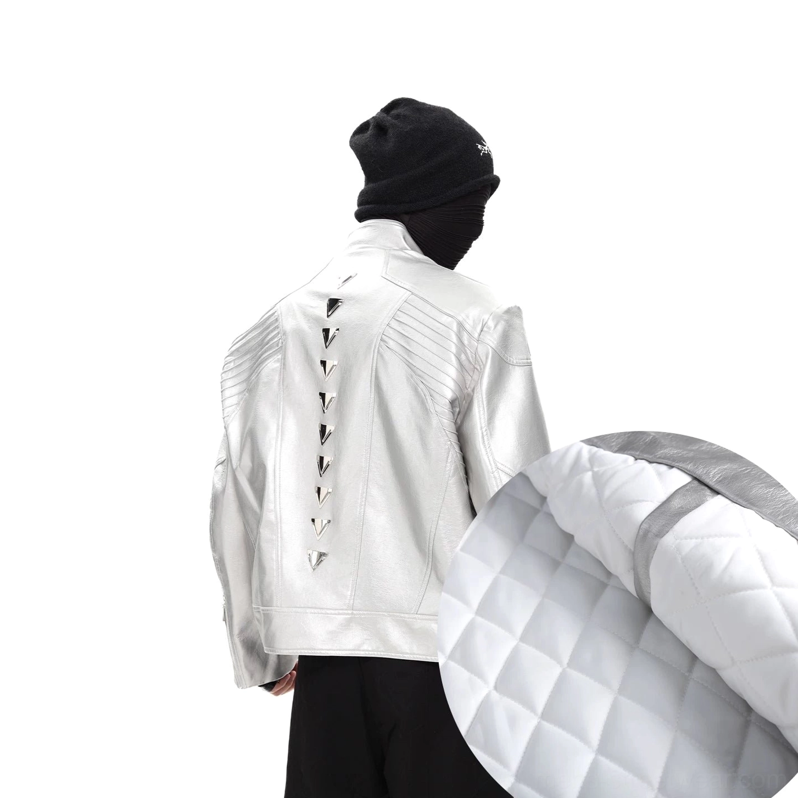 Silver studded faux leather moto jacket with white quilted fleece lining and metallic spine stud detail