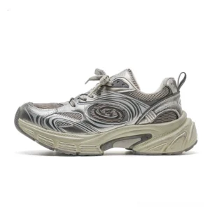 Side view of silver swirl chunky retro sneakers with metallic layered panels, breathable mesh sections, cream platform outsole, and Korean streetwear styling