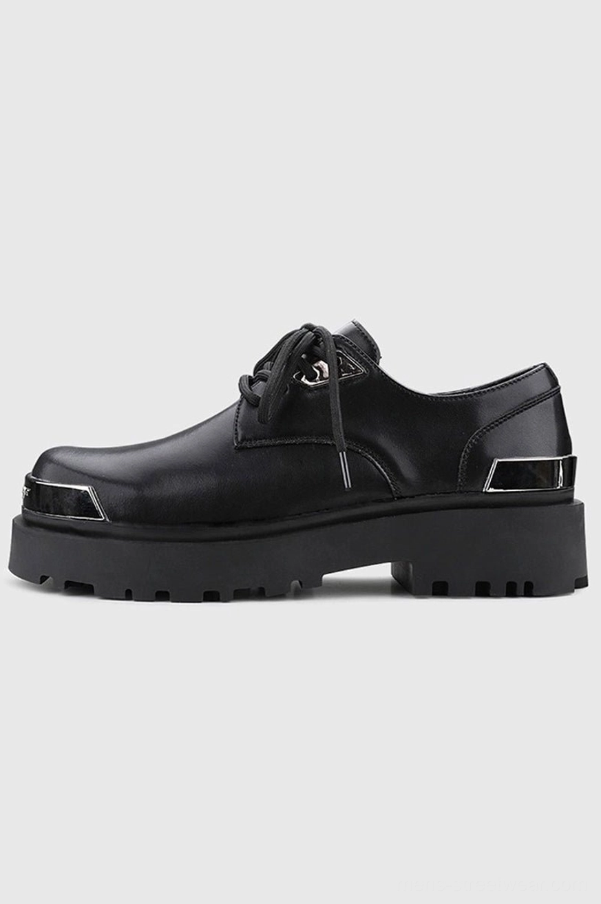 Single black platform derby shoe shown from a three-quarter side angle with silver metal toe cap, heel trim, glossy upper, and chunky lug sole