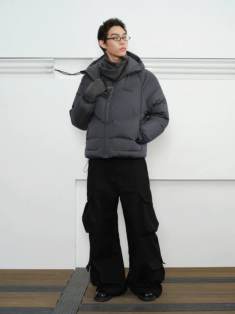 Slate grey urban streetwear down puffer jacket back three-quarter view showing attached hood and adjustable hem