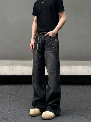 Smoke washed black wide leg graffiti streetwear jeans front full body outfit on male model