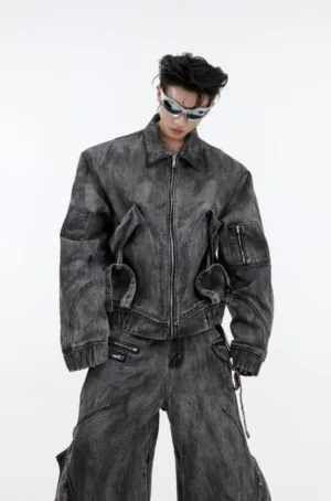 Smoked gray distressed utility denim jacket front view with oversized cargo chest pockets and zip closure