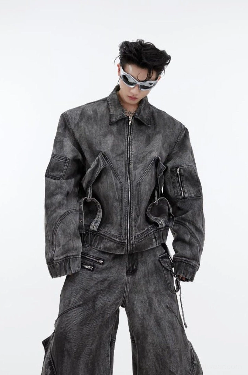 Smoked gray distressed utility denim jacket front view with oversized cargo chest pockets and zip closure