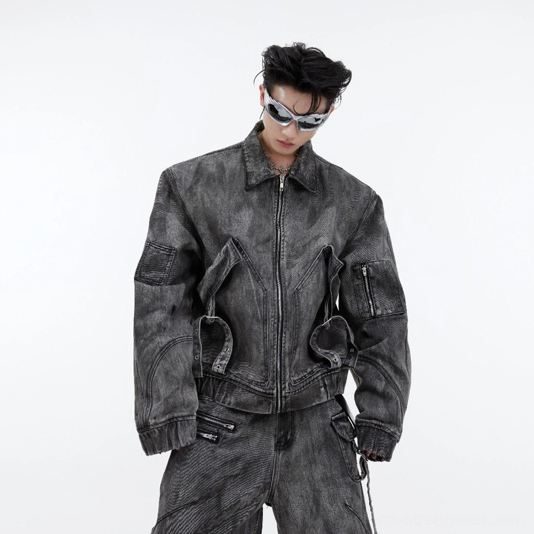 Smoked gray distressed utility denim jacket front view with zip fastening oversized pockets and faded denim wash