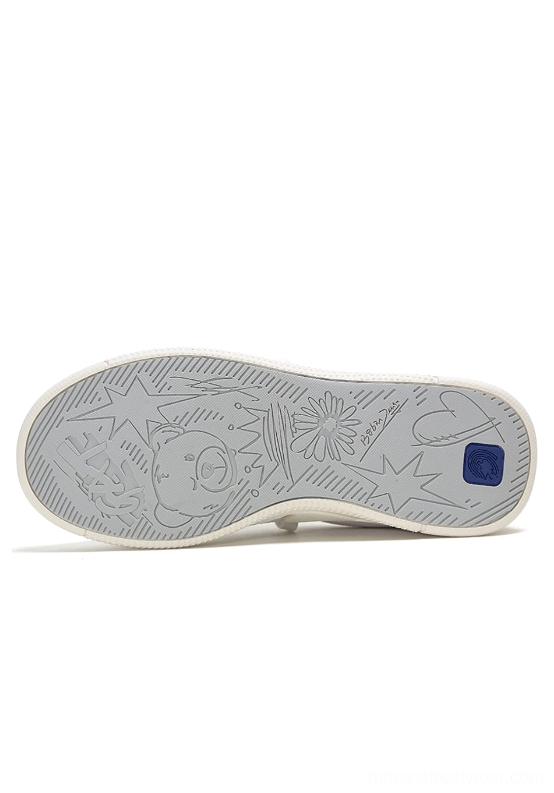 Unisex black and white solar star applique sneakers with asymmetrical lace detail and retro court styling
