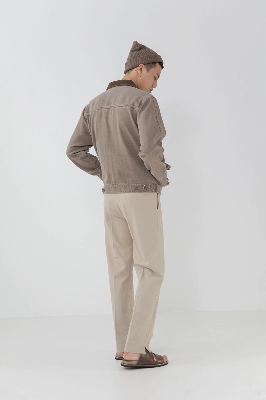 Split hem pants back view double welt pocket construction tailored silhouette