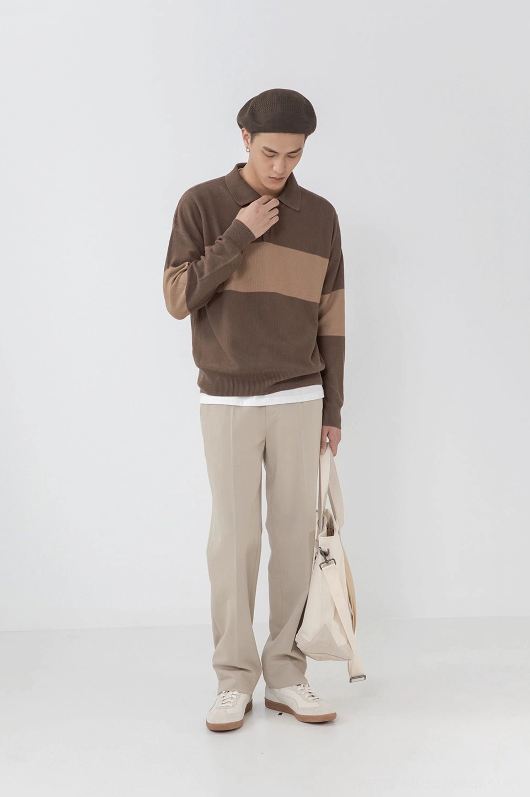 Front close-up male model beige split hem straight pants layered colorblock long-sleeve tailored fit