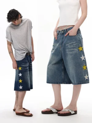 Dark blue vintage wash star appliqué wide-leg denim shorts front full-body streetwear model view