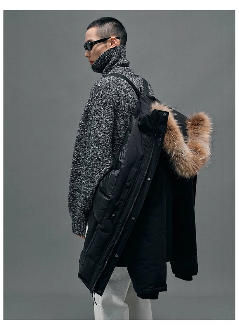 Statement winter streetwear coat with dramatic hood, rich fur collar texture and relaxed A-line silhouette