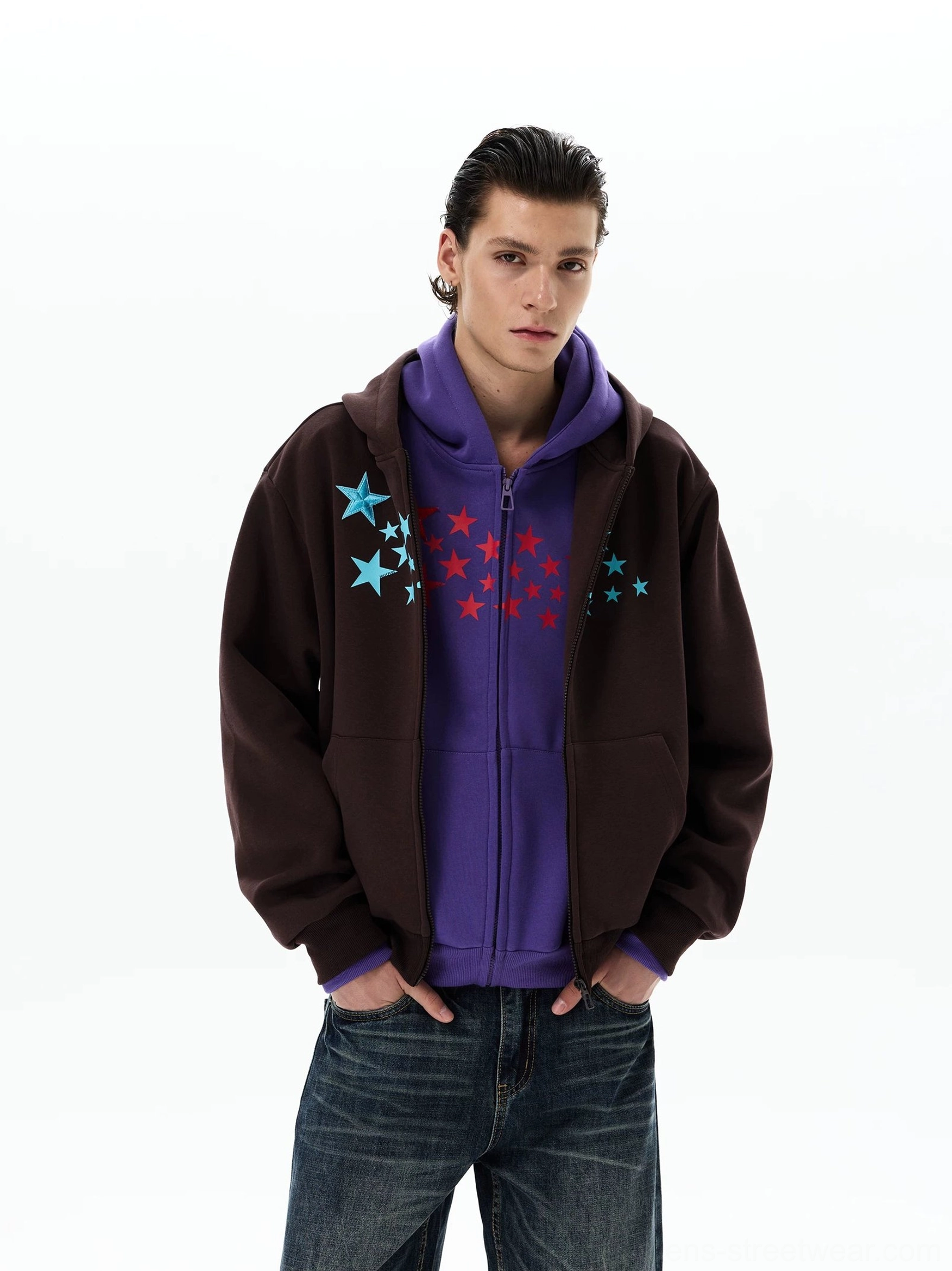 Brown Stellar Drift star print oversized zip-up hoodie worn with dark wide-leg jeans, front half-body streetwear look