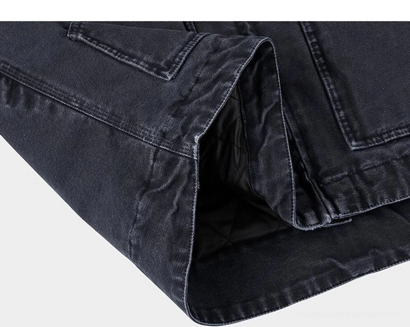 Streetwear utility jacket in a relaxed silhouette with corduroy collar, patch pockets, and adjustable cuffs