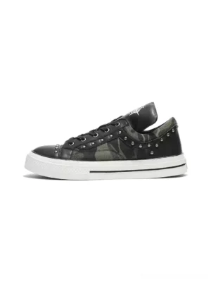 Studded camouflage panel platform sneaker in black synthetic leather with silver rivets and white rubber sole side view
