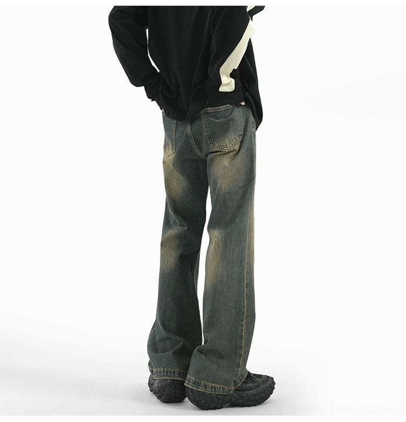 Rear view of sunfade wide-leg denim pants with vintage fading, practical back pockets, and relaxed streetwear fit