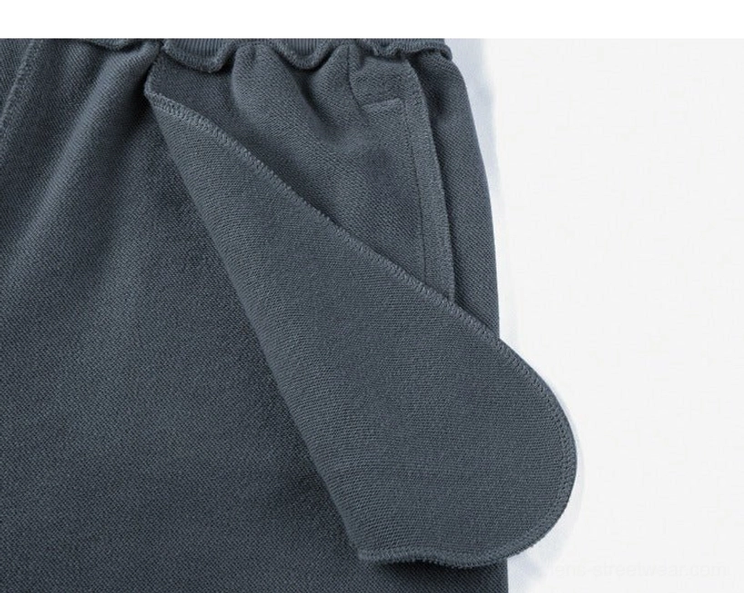 Waistband construction detail drawstring sweat shorts elastic reinforcement stitching quality craftsmanship premium shorts detail